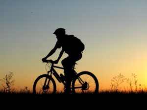 istock sunset bike rider facing left