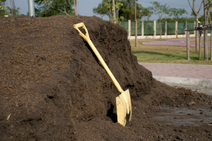manure pile with shovel
